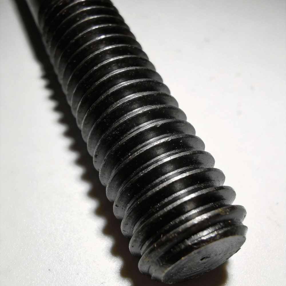 Fully threaded studs and rods with matte black coating for high-pressure piping.
